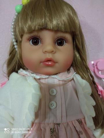 Boneca bebê reborne loira