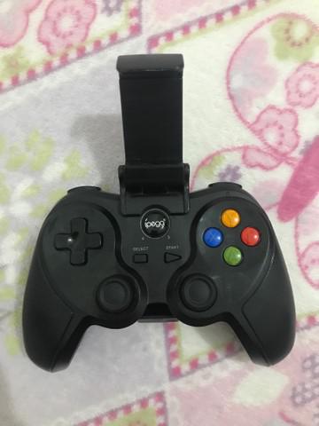 Controle joystick ípega nunca usado