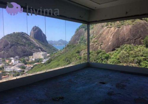 tima sala vista deslumbrante para a baia, prédio alto