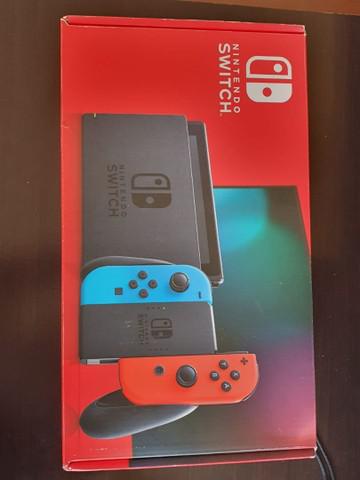 Nintendo switch semi novo na caixa