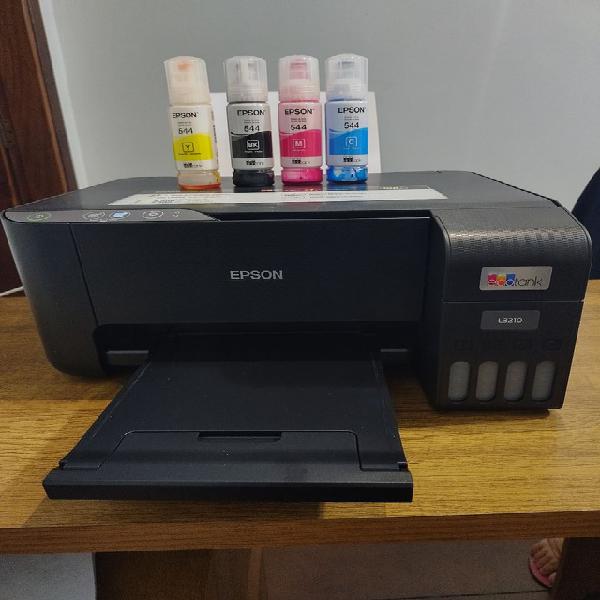 Impressora epson l3210 na caixa.