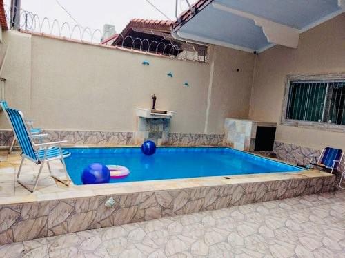 Casa com piscina praia grande caiçara