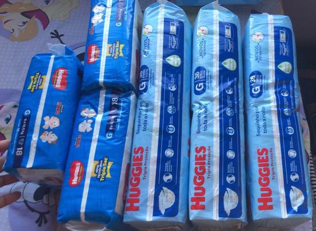 Fraldas descartáveis HUGGIES, tamanho G