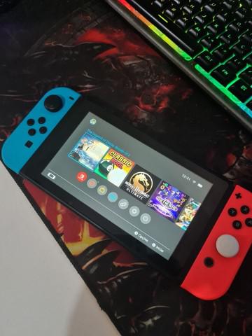 Nintendo switch + 29 jogos + controle original + 2 cartões