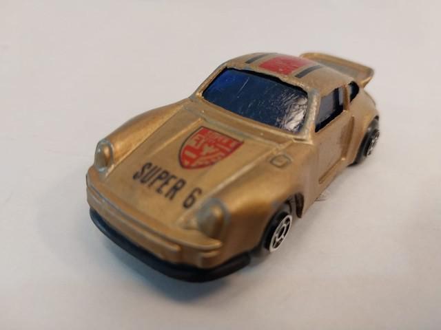 Miniatura em metal porsche dourada super 6 made in china esc