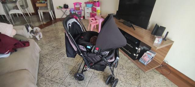 Carrinho dobrável + bebê conforto voyage status