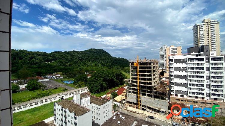 Apartamento em praia grande no canto do forte, sendo 2 dormitórios, 1 suíte