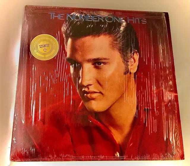 Lp(raro vinil)elvis the number one hits. incluindo pôster